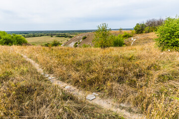 a plateau and open-air museum on the right bank of Don River, a steppe with remains of chalk pillars or limestone outcrops, known for its cave temples. Russia