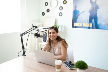 Female radio host working in a podcast