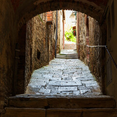 Dark alley in an old village