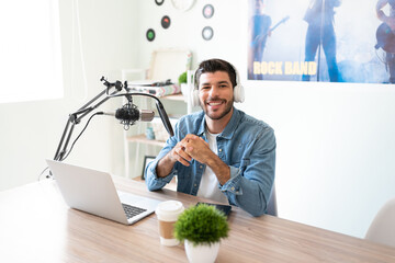 Male announcer working at a radio station