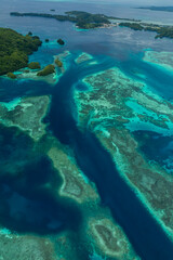 Aerial shot of tidal channel, coral reef and islands in Palau, Micronesia