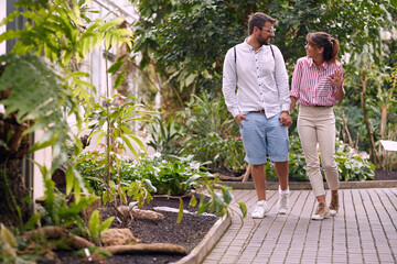 Young couple in visit to a botanical garden