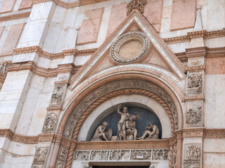 Details of facade of basilica di San Petronio on Piazza Maggiore in Bologna, Italy
