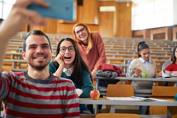 Group of students taking selfie at the lecture break