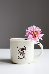 View of coffee mug and inscription 