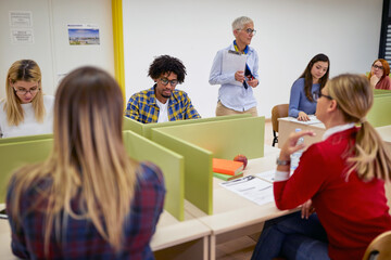 Female professor and students at the lecture