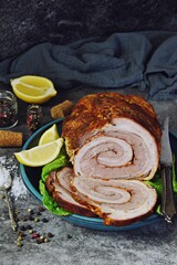 Roasted pork meat sliced on the plate. Christmas baked spicy glazed meat
