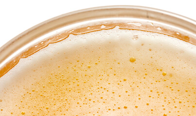 Mug of foamy beer isolated on white background.