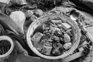 Boiled rice with pork, porn bone and thai pork sausage in bowl. Thailand is a popular breakfast.