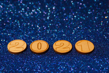 Happy New Year 2021. Wood text on shiny background. Perfect for your invitation or office postcard