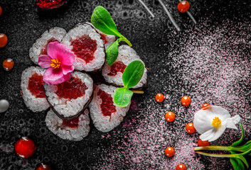 sushi roll with tuna and rice in plate