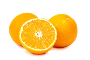 Two whole oranges and half an orange isolated on a white background