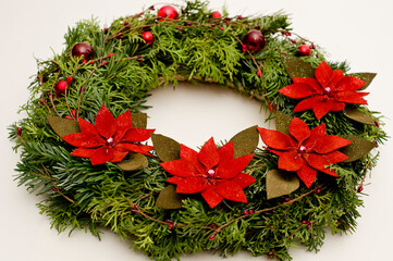 Festive background with an Advent wreath. Christmas lights. Handmade decoration.