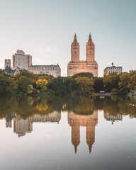 Obraz premium Buildings in the Upper West Side and The Lake, in Central Park, Manhattan, New York City