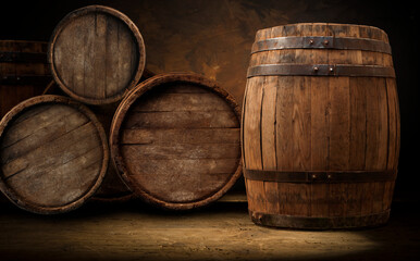 Fototapeta premium Old wooden barrel on a brown background