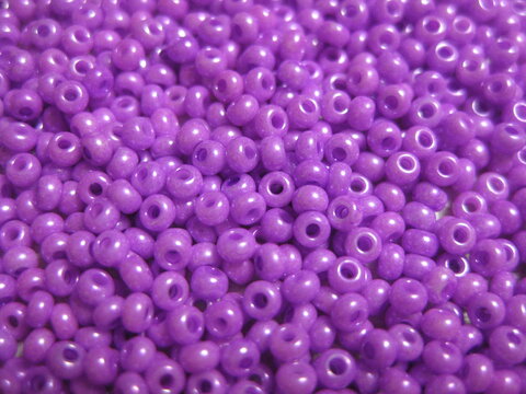 Beads of lavender color close-up. © Егор Мелентьев