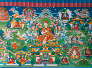 CHAME, NEPAL - APRIL 30, 2020: Old buddhist fresco at the gate of Chame village in Annapurna Circuit - most popular tourists trek in Himalayan mountain massive in Nepal on 30 April 2020