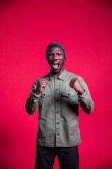 Young Black Man Shouting on Isolated Background