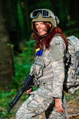 Female soldier in the forest