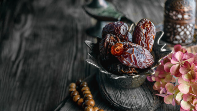 Royal Gold Cup With Dates For Tea. Oriental Holiday Table, Oriental Sweets For Tea. Copy Space