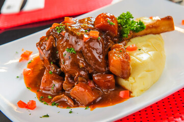 Baked leg of mutton with mashed potatoes
