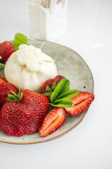 Fresh burrata of mozzarella cheese with peas and fruits side dish on white background