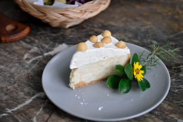 coconut cake with cream and macadamia