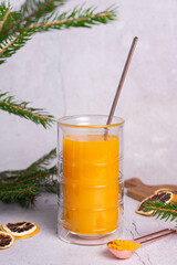 selective focus. honey cake with delicate cream. on a light background with craft paper. in the background is a jar of light honey
