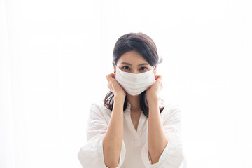 Woman is wearing medical mask  (work from home)