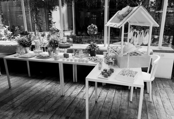 Special event in Latin American baby shower, decorations and high quality pastry in Guatemala on an interior table of a restaurant.