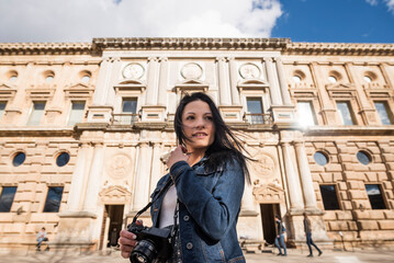 Fototapeta premium Tourist young woman in Carlos V palace, in 