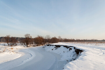 Fototapeta na wymiar winter landscape on a frozen river