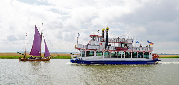 Zees boat and mississipi paddle boat on the Bodden of Zingst