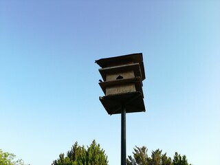 wood and decorative birdhouse