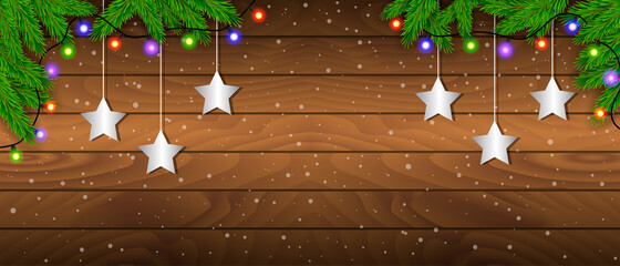 Christmas wooden background with branches and baubles