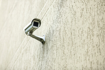 Surveillance camera on a building wall. 