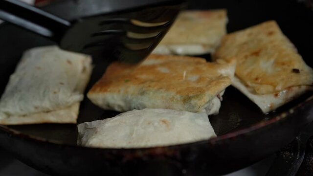 Fry pita bread in a pan
