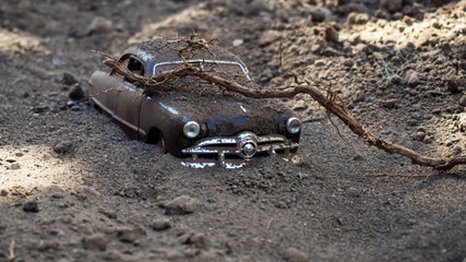 Old car in the dirt
