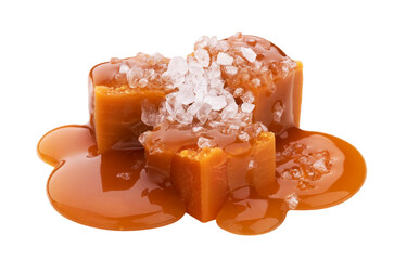 Toffee candies with caramel sauce and salt isolated on white background