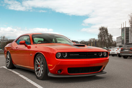 Kiev, Ukraine - April 21, 2020: Muscle Car Dodge Challenger SRT8 392 HEMI In The Parking Lot. Red Car