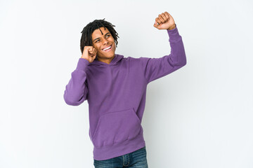Fototapeta premium Young african american rasta man dancing and having fun.