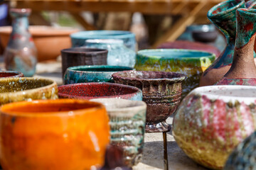 Beautifully crafted clay pots for gardening and decoration. Modern design and interior style details.Colorful ceramic pots for the selling.