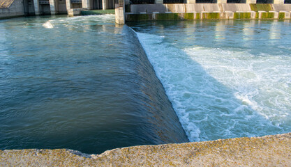 Rocks in the riverbed blue background summer