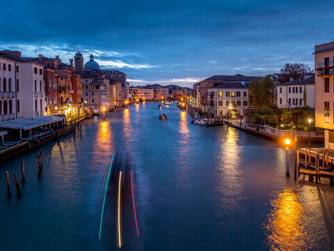 Blurred motion of boats moving in Grand Canal at dawn