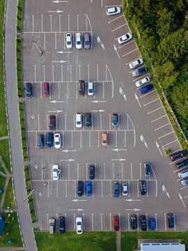 Aerial view of cars parked in outdoor parking lot