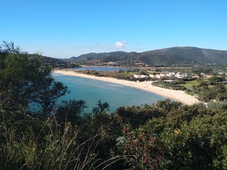 Mediterranean seascape, coastline and turquoise water from Chia tower in Sardinia, Italy 