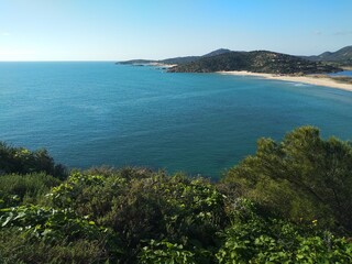 Fototapeta na wymiar Mediterranean seascape, coastline and turquoise water from Chia tower in Sardinia, Italy 