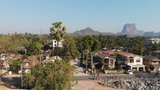 Aerial View of Rural Local Village in Myanmar (Burma) with Mount Zwegabin
