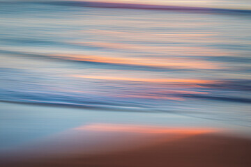 Blurred motion of ocean at dawn