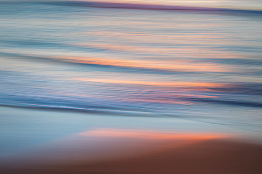 Blurred motion of ocean at dawn